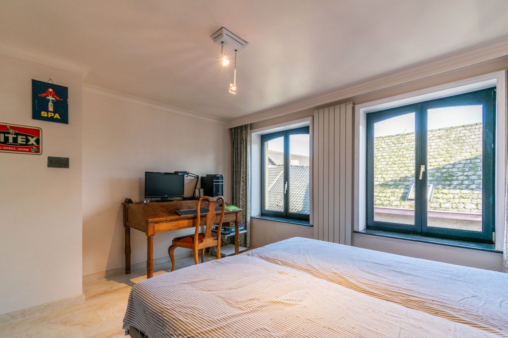 Karaktervol hoogwaardig afgewerkt gebouw met winkelruimte en woonst  foto 8