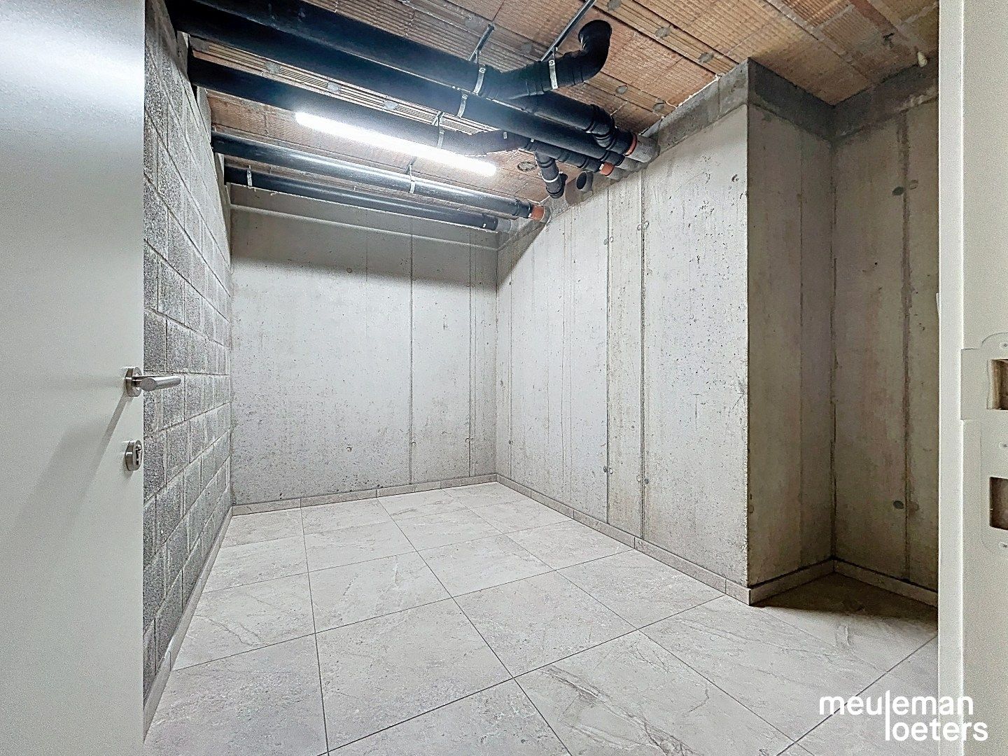 Ruim nieuwbouwappartement met garage foto 15
