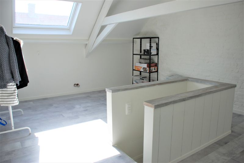 Volledig vernieuwde woning met binnenkoer foto 18