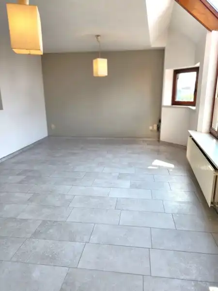 Tweeslaapkamer appartement mét garage in het centrum van Sint-Baafs-Vijve ZONDER SYNDICKOSTEN! foto 7