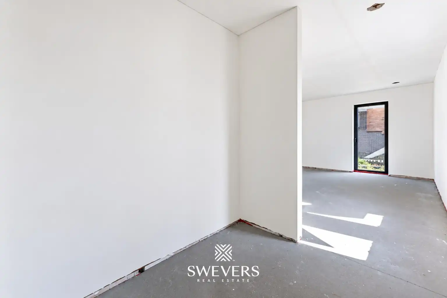 Gelijkvloers 3-slaapkamer appartement met eigen inkom en 2 terrassen in Houthalen foto 3