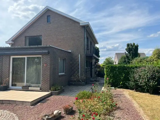 Karaktervolle woning op uitzonderlijk ruim perceel nabij het centrum van Diepenbeek! foto 3