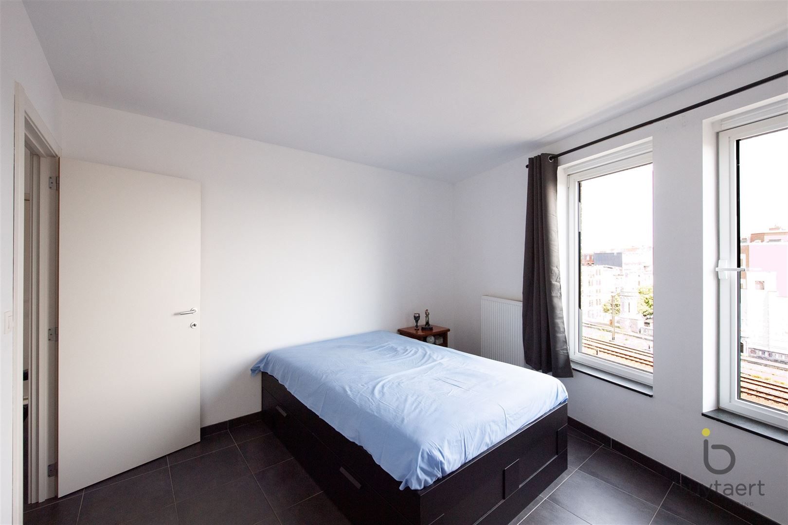 Lichtrijk hoekappartement met prachtig vergezicht over de stad + P foto 15