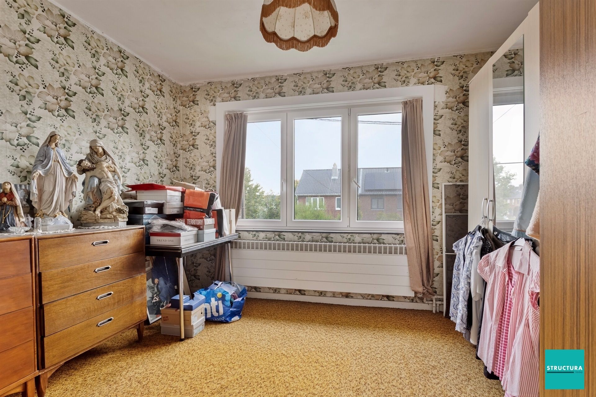 Driegevelwoning met zuid-west tuin in rustige straat foto 9