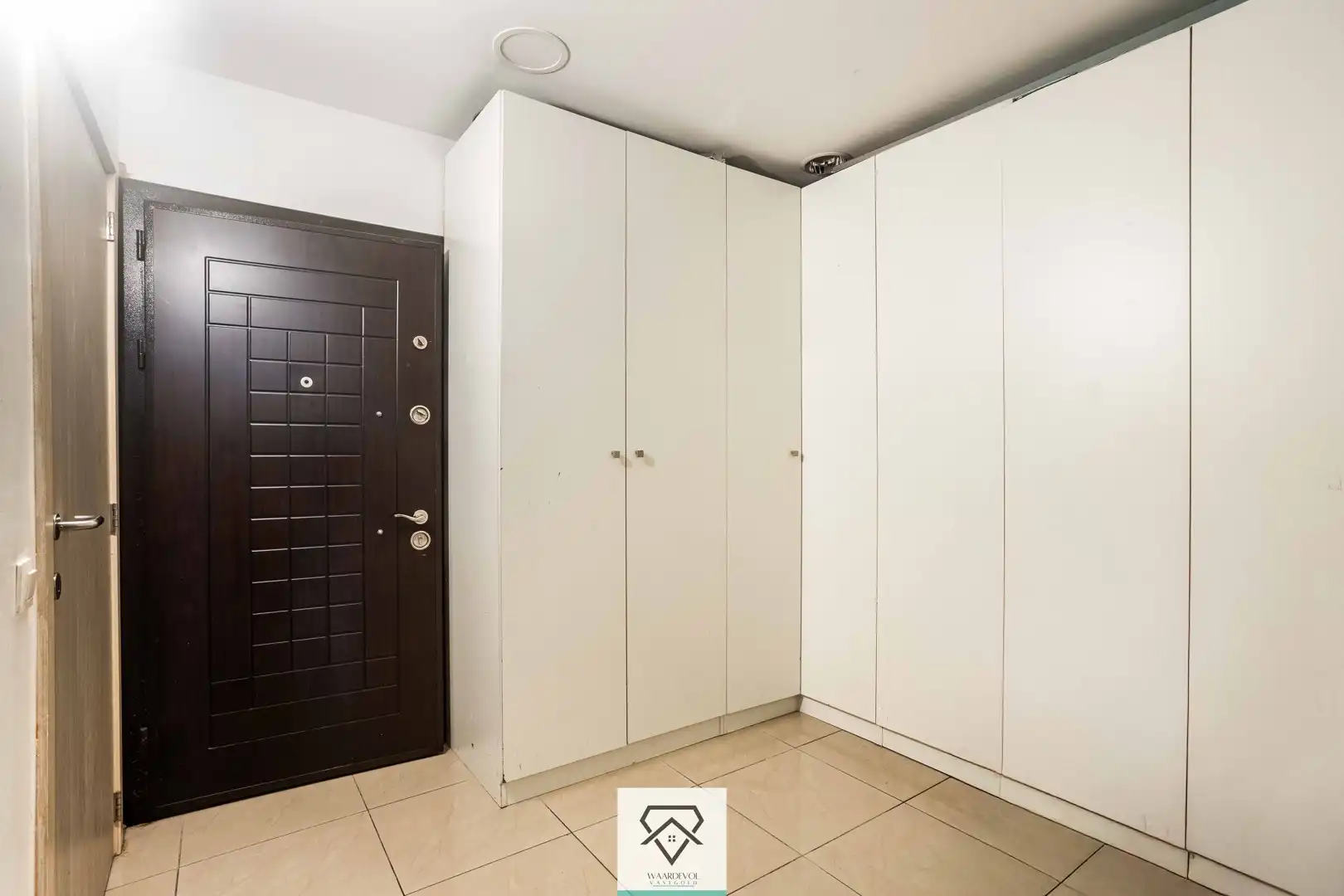 Ruim handelshuis te koop bestaande uit duplexappartement en dubbele handelsruimte foto 11