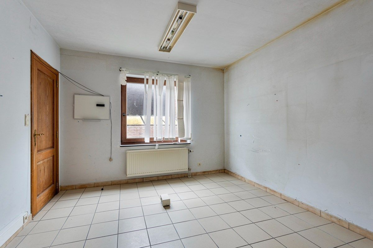Grote woning in Tongeren centrum met ruimte voor burelen of praktijk foto 9