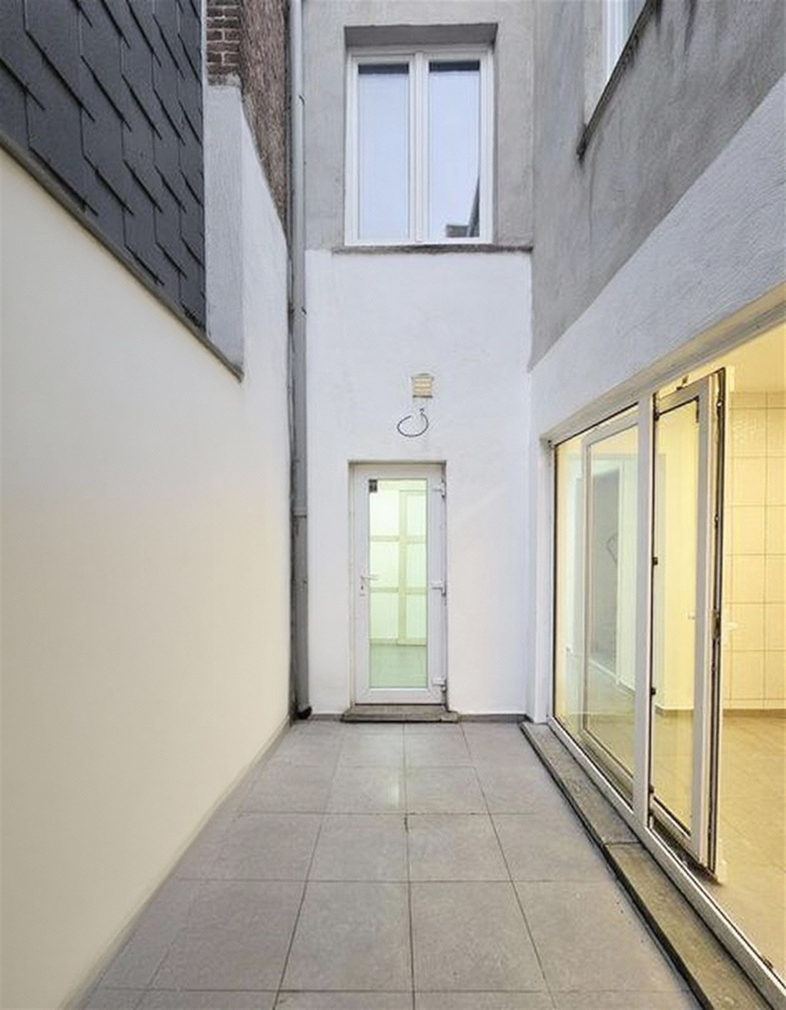 Gunstig gelegen ruime woning met stadskoer. foto 7