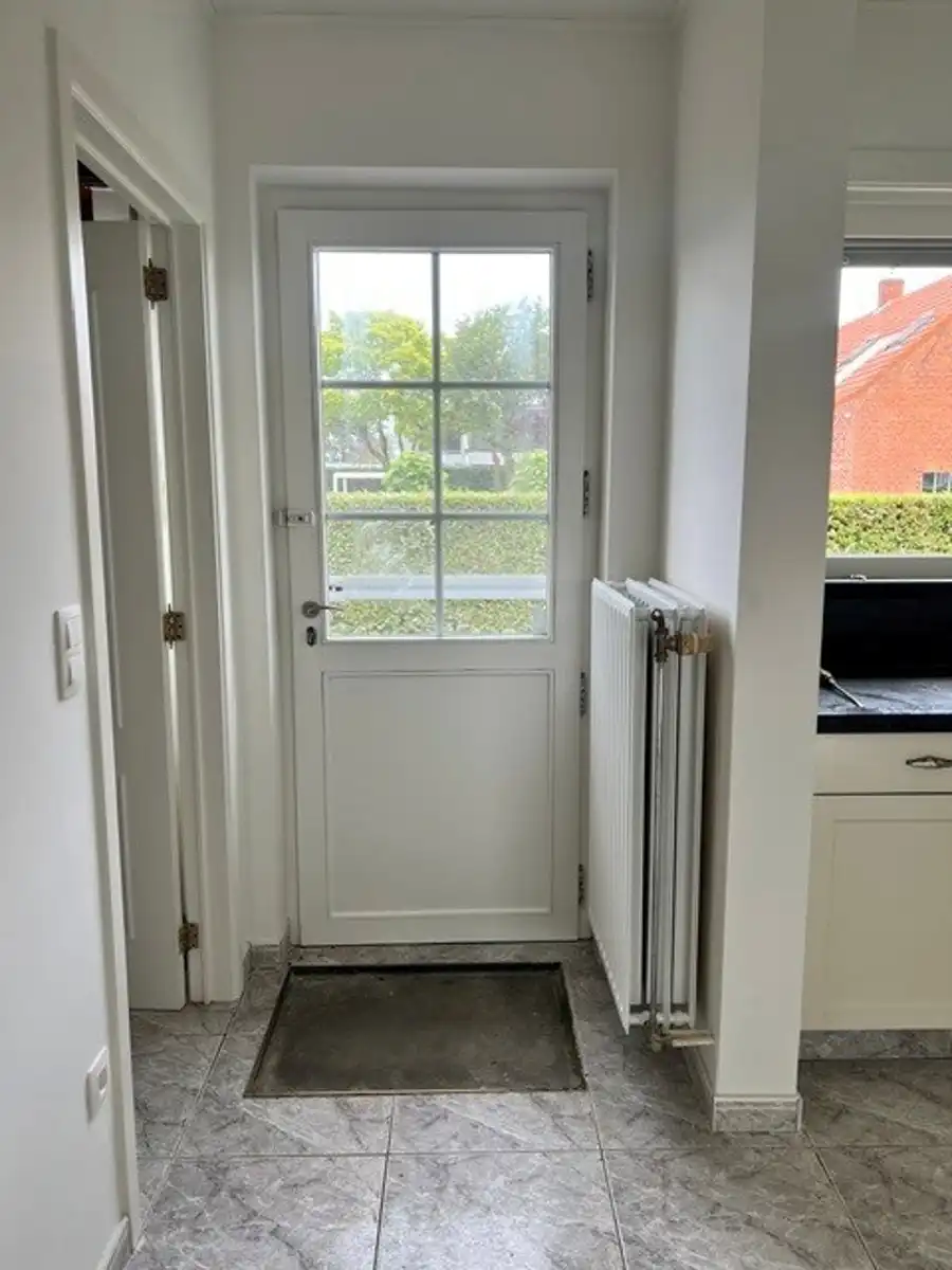 Vrijstaande woning met grote tuin en inpandige garage in Minderhout foto 4