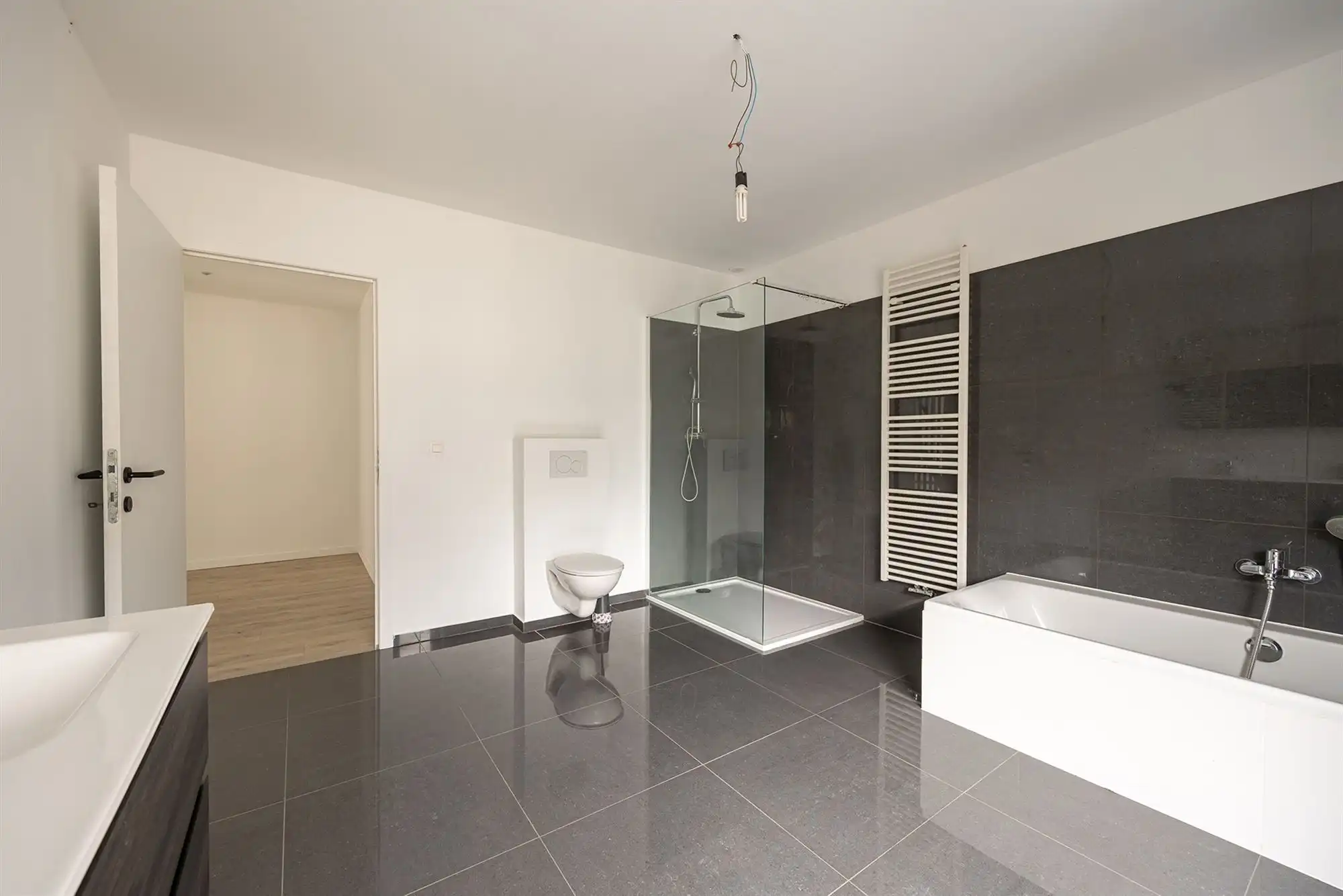 Ruime, energiezuinige woning met tuin in Rumst foto 12