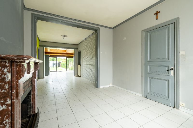 Ruime en veelzijdige rijwoning met garage achteraan en aparte ingang foto 4