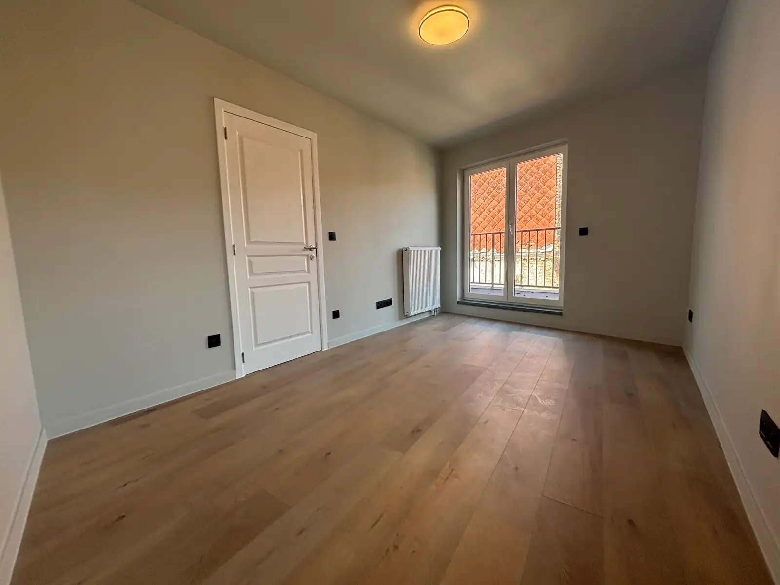 Stadswoning met autostaanplaats foto 12
