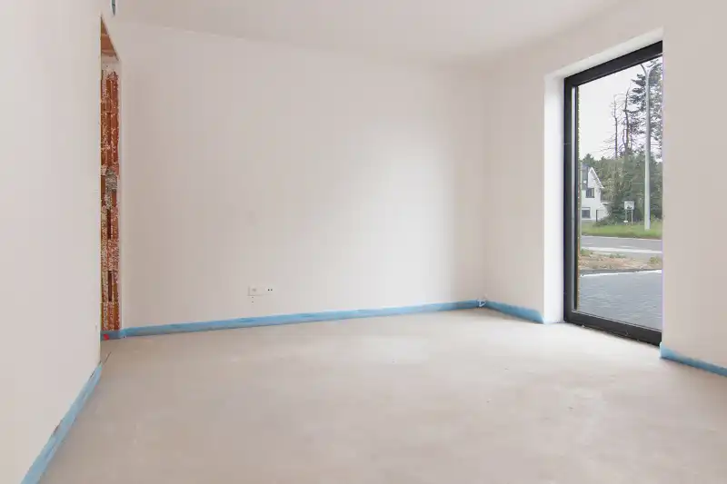 Ruim gelijkvloers nieuwbouwappartement met 2 slaapkamers, terras en een mooie tuin op een goed bereikbare locatie! foto 7