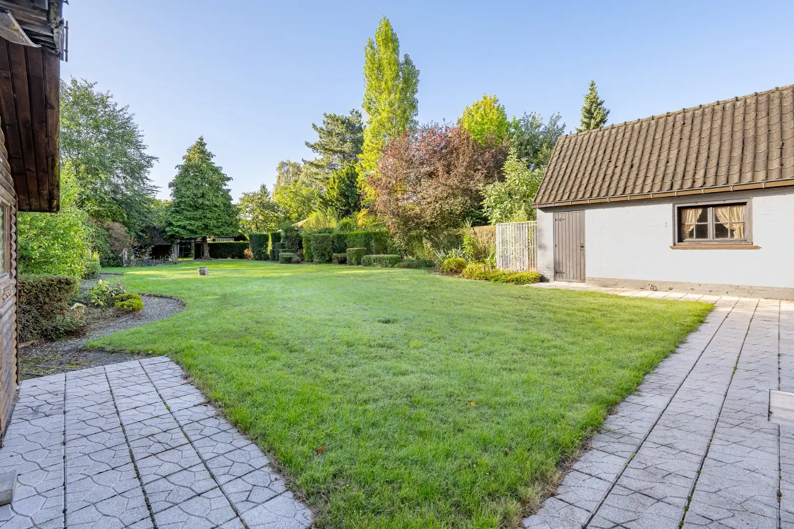 Ruime open woning met 4 slaapkamers, garage en zuidgerichte tuin in Lauwe foto 16