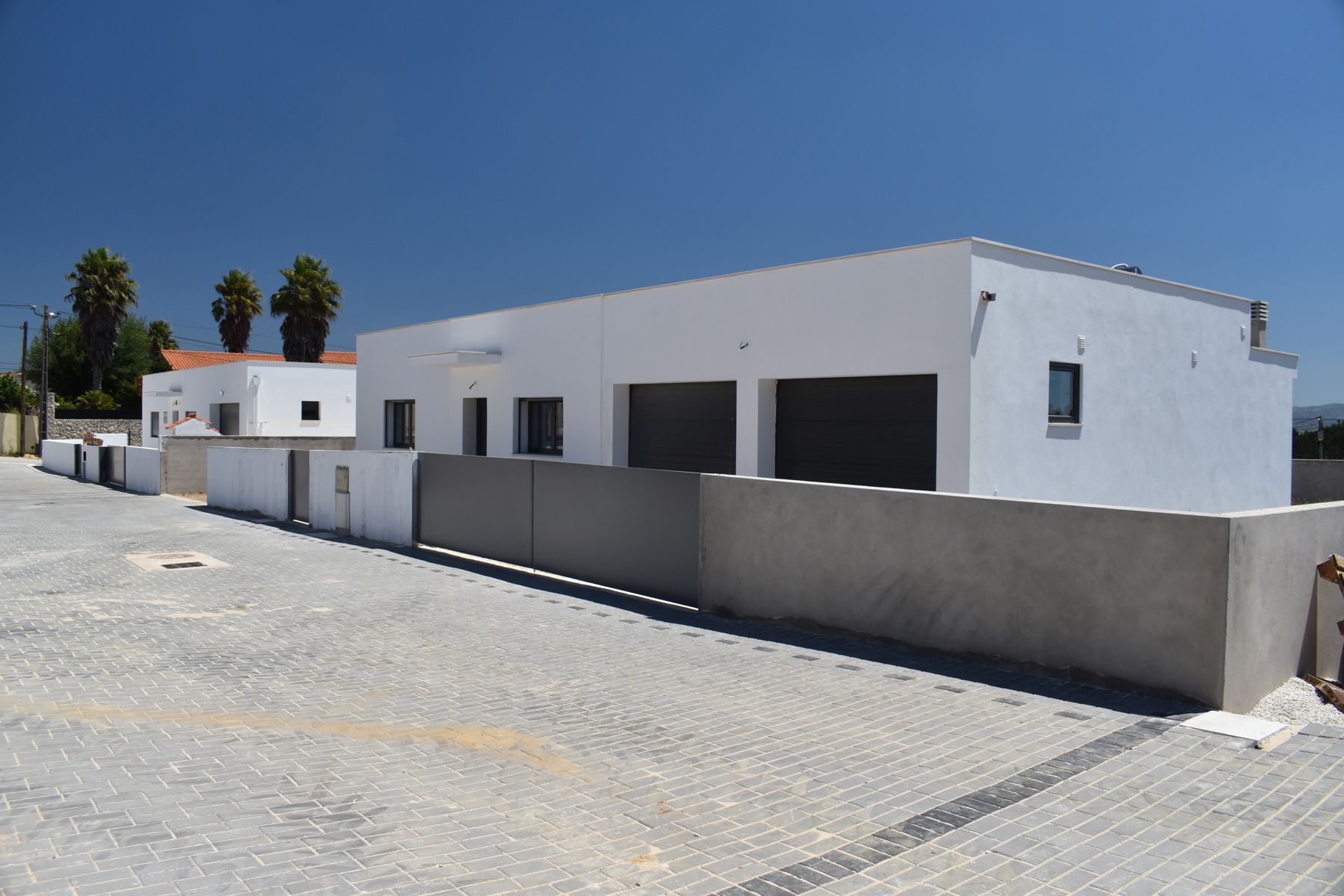 Vrijstaande gelijkvloerse nieuwbouw villa. foto {{pictureIndex}}