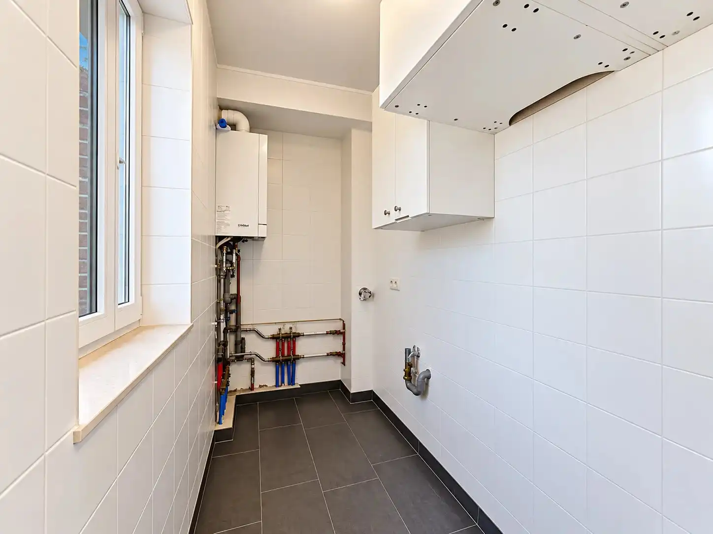 Zeer ruim duplex appartement met mogelijk 4 slaapkamers, ruim terras en garage vlakbij het centrum. foto 13