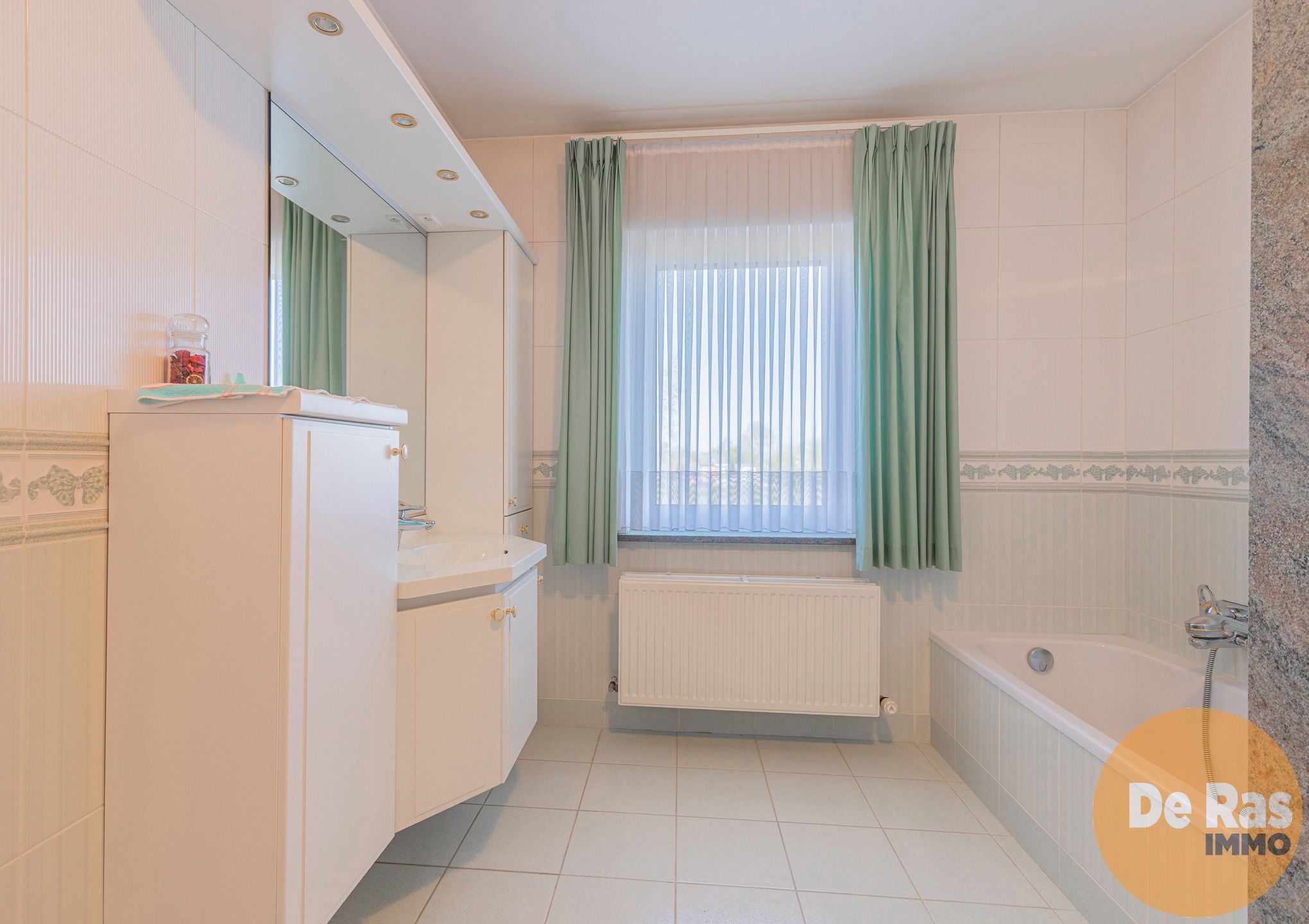 NIEUWERKERKEN - Kwalitatieve woning met diepe tuin en garage foto 16