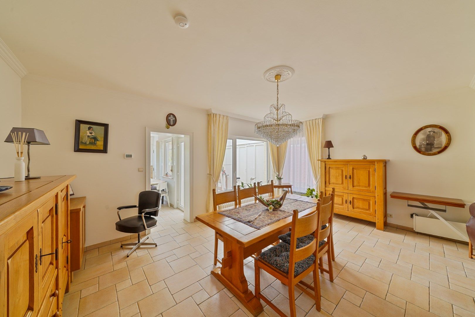 Halfopen woning met garage en zonnig terras te Mariakerke foto 7
