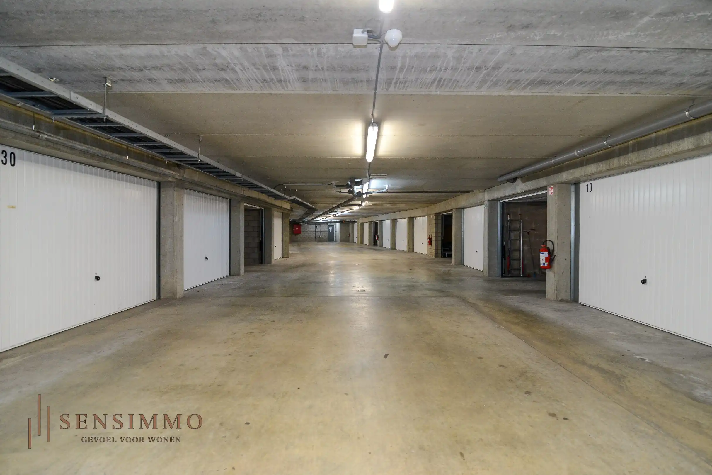 Instapklaar 2-slaapkamerappartement met dubbele terrassen en garagebox in hartje Eisden foto 19