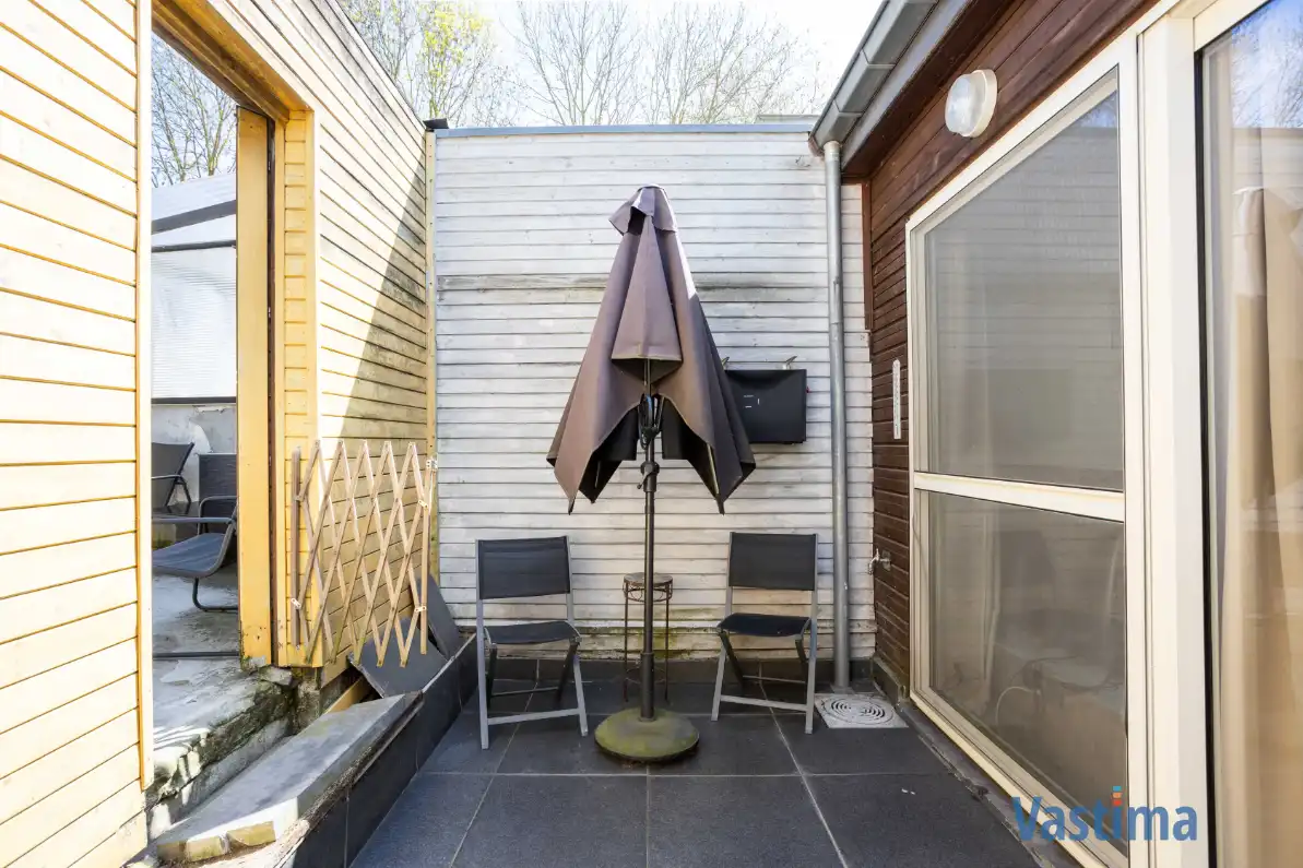 Energiezuinige en instapklare starterswoning met 2 slaapkamers in hartje Erembodegem foto 16