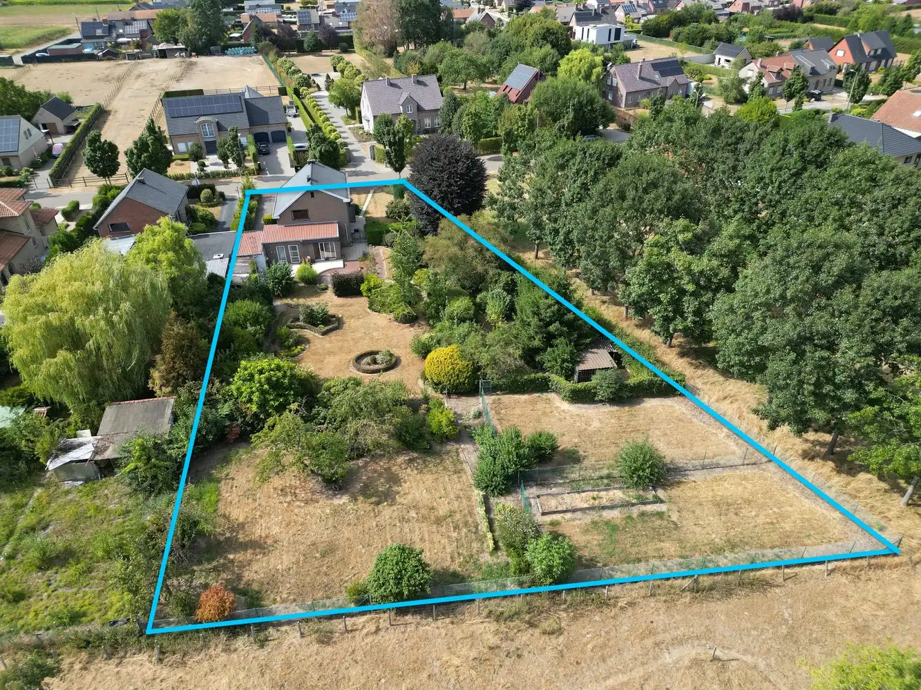 Karaktervolle woning op uitzonderlijk ruim perceel nabij het centrum van Diepenbeek! foto 4
