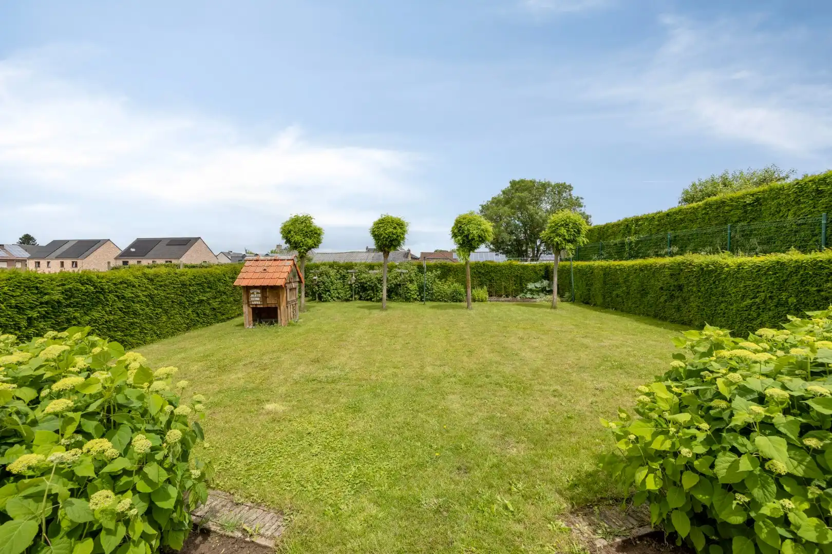 Ruime, verzorgde woning met prachtige tuin en terras - rustig gelegen te Rutten foto 3