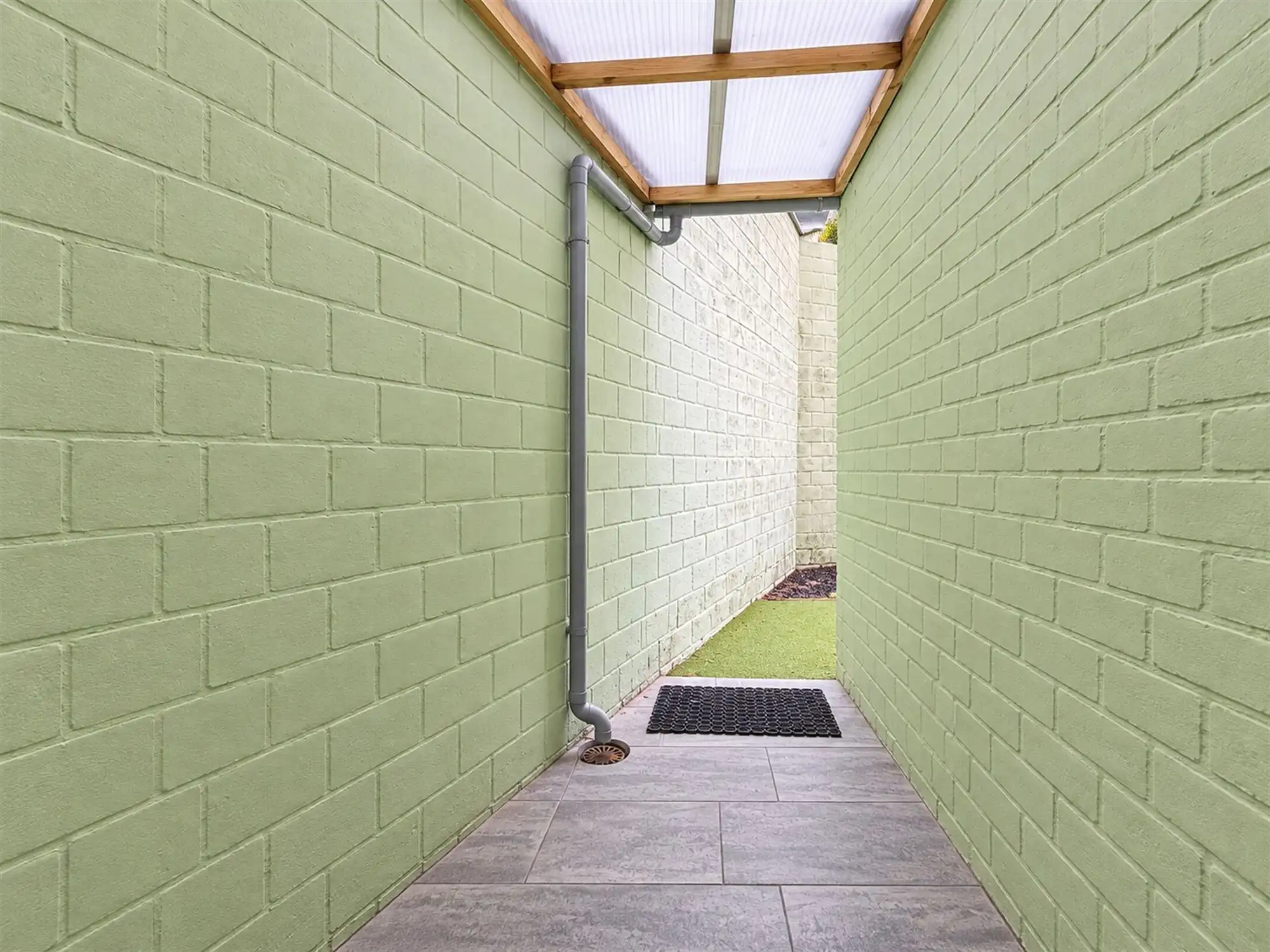 Gelijkvloers appartement met 2 slpk, garage en tuintje foto 7