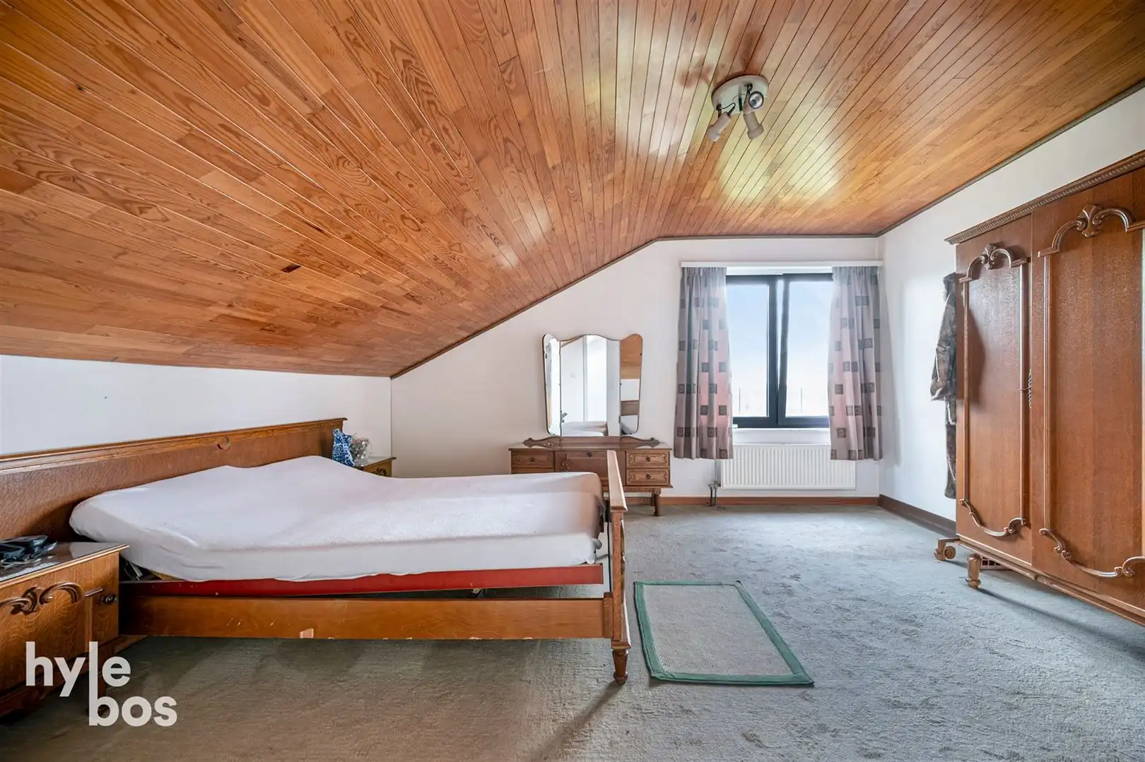 Ruime open bebouwing met 4 slaapkamers, garage en tuin in zeer rustige ligging foto 19