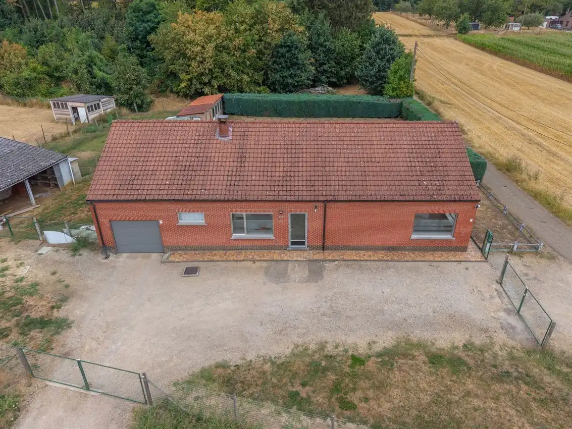 Gelijkvloerse woonst, 3 slpk, op 29a 53ca foto 24