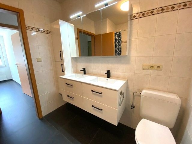 Gelijkvloers 2 slaapkamer appartement met garage in centrum van Geel foto 12