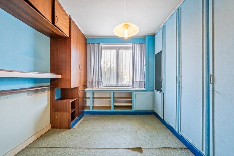 Ruime te renoveren rijwoning met zeer veel mogelijkheden en tuin foto 10