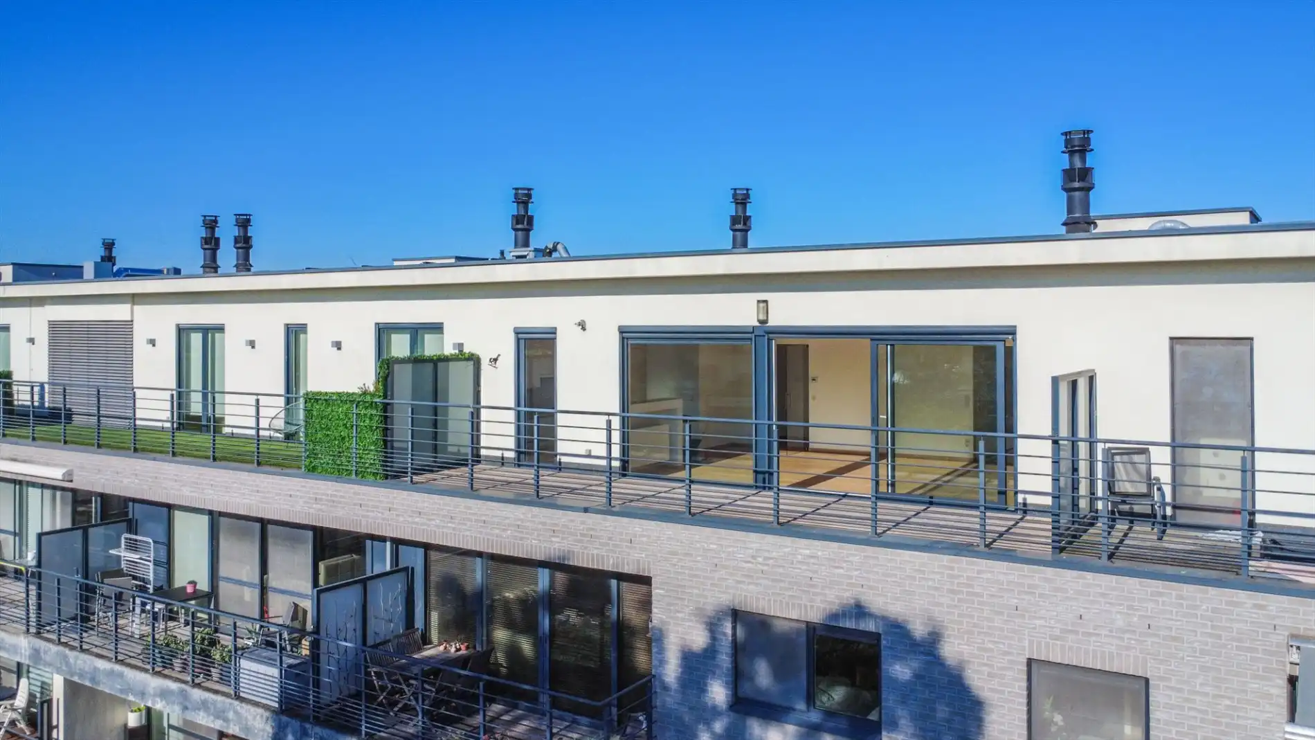 LICHTRIJKE PENTHOUSE MET 2 PANORAMISCHE TERRASSEN ! foto 4