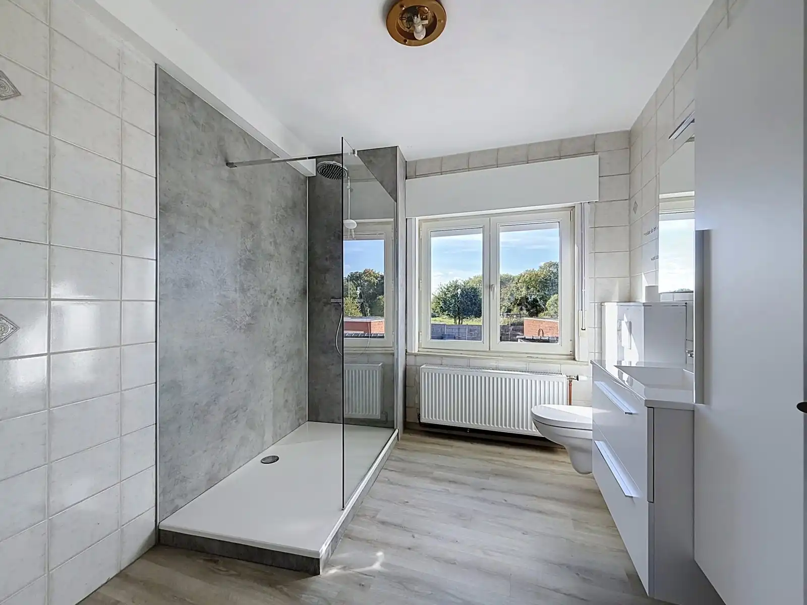 Gezinswoning met 2 SLPK, Tuin én Garage! foto 11