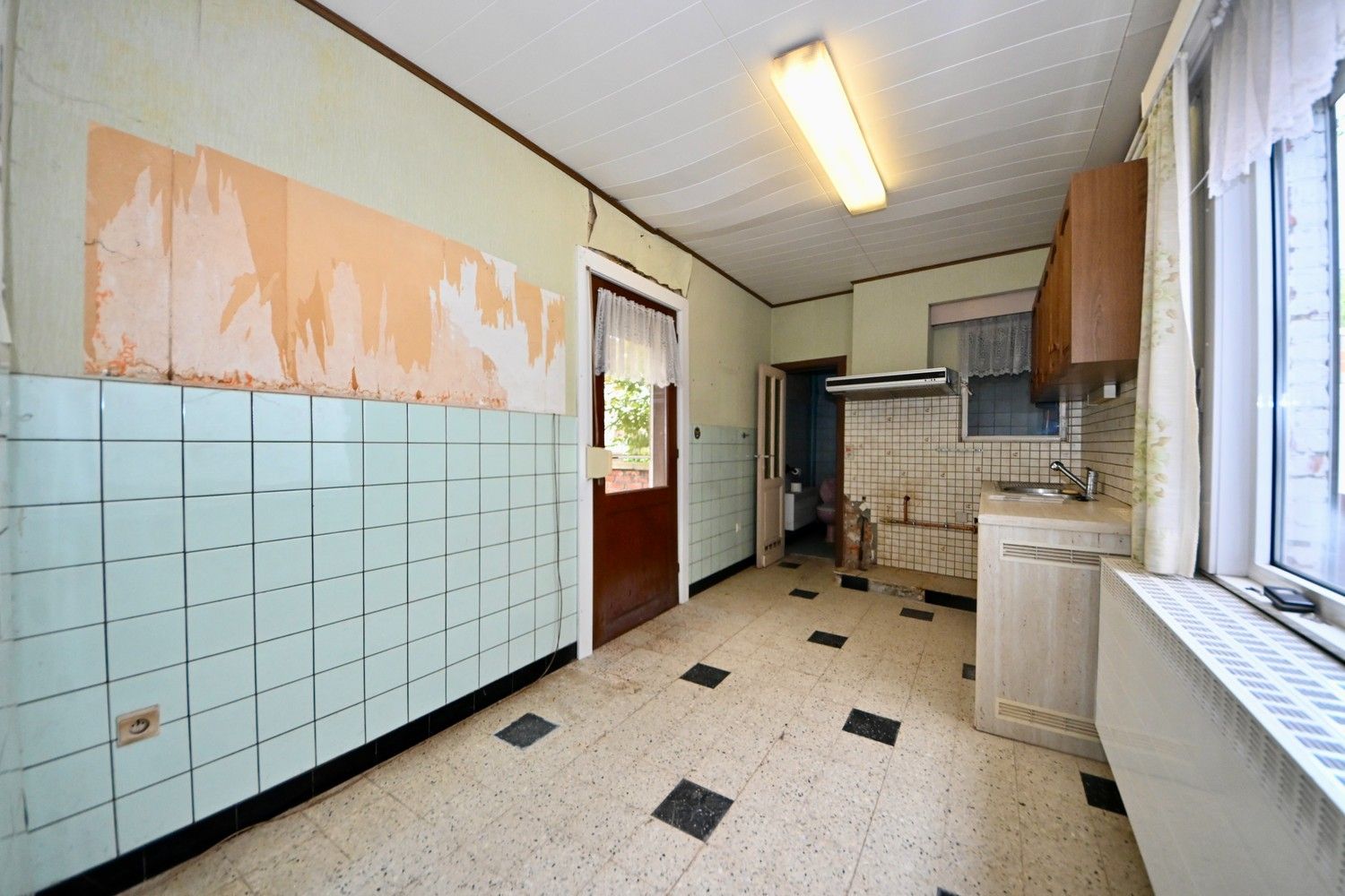 Woning met 2 slaapkamers, tuin en garage. foto 6