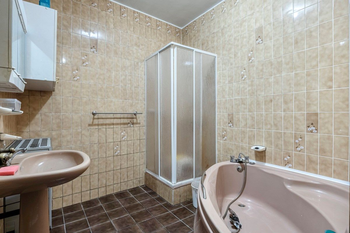 Ruime woning met 3 slaapkamers en grote tuin foto 11