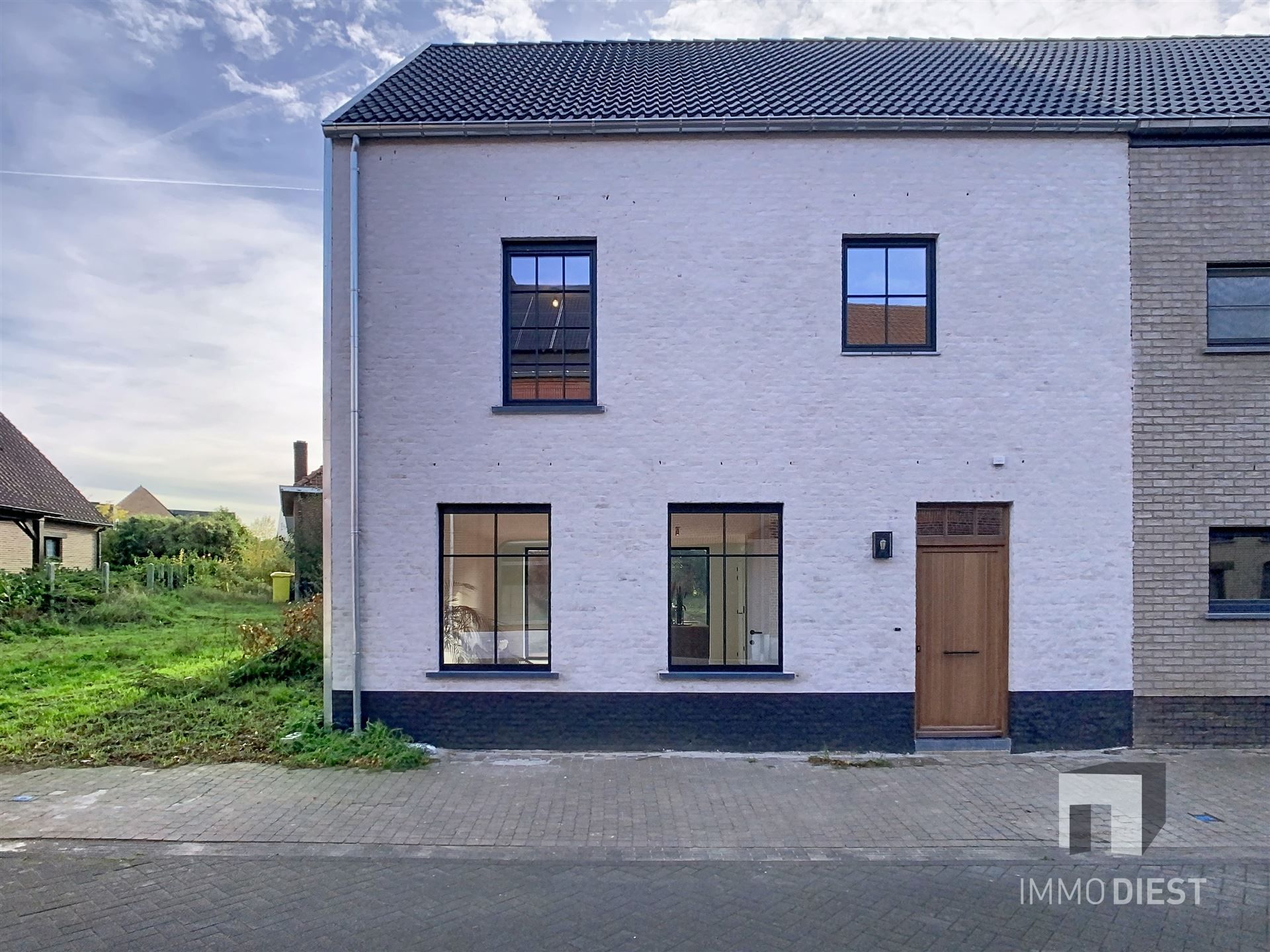 Charmante energiezuinige nieuwbouwwoning met zonnige tuin in hartje Zichem. foto 29
