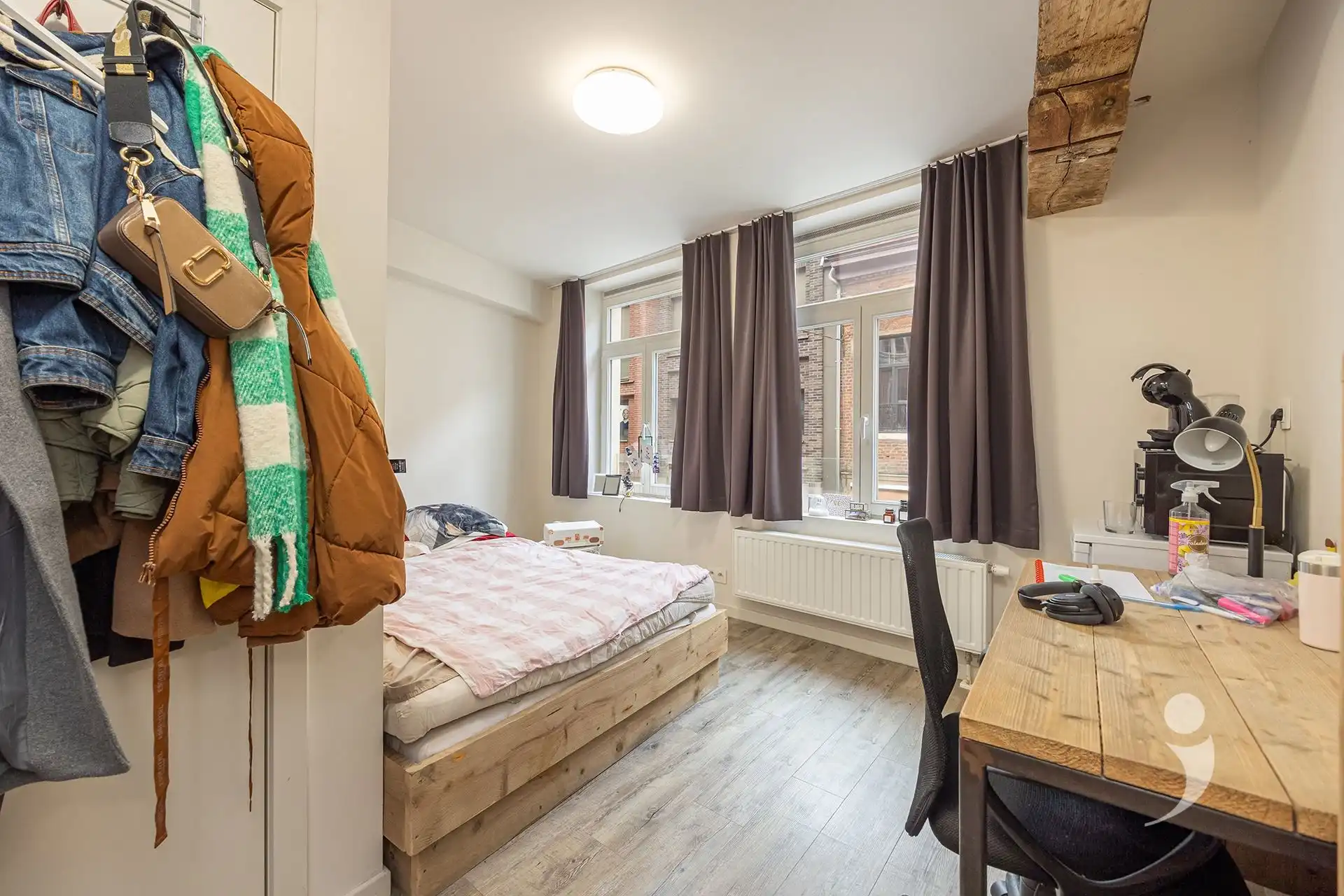 Opbrengsteigendom met 21 kamers, 1 studio en grote handelszaak foto 15