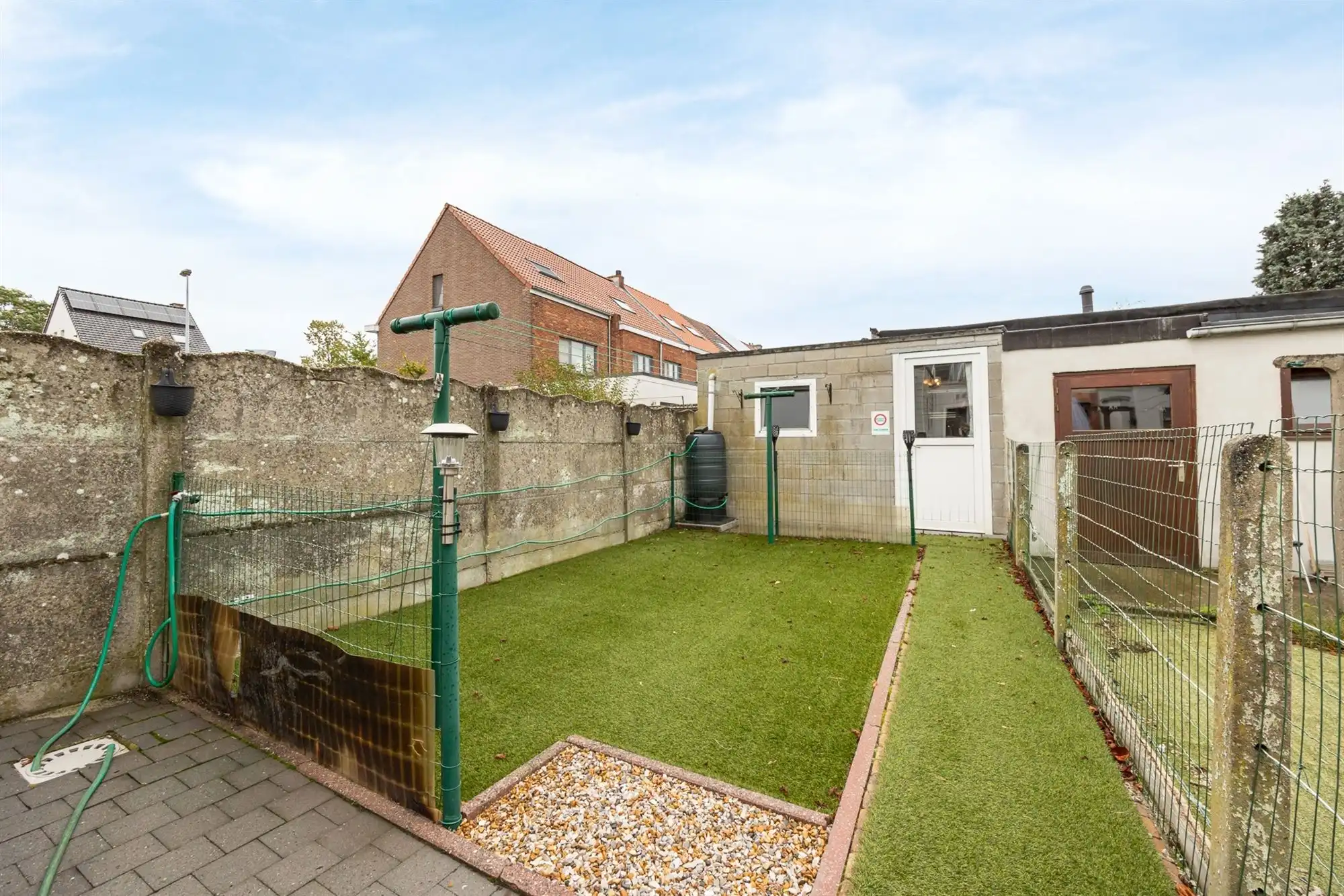 Gezinswoning met twee slaapkamers en tuin foto 14