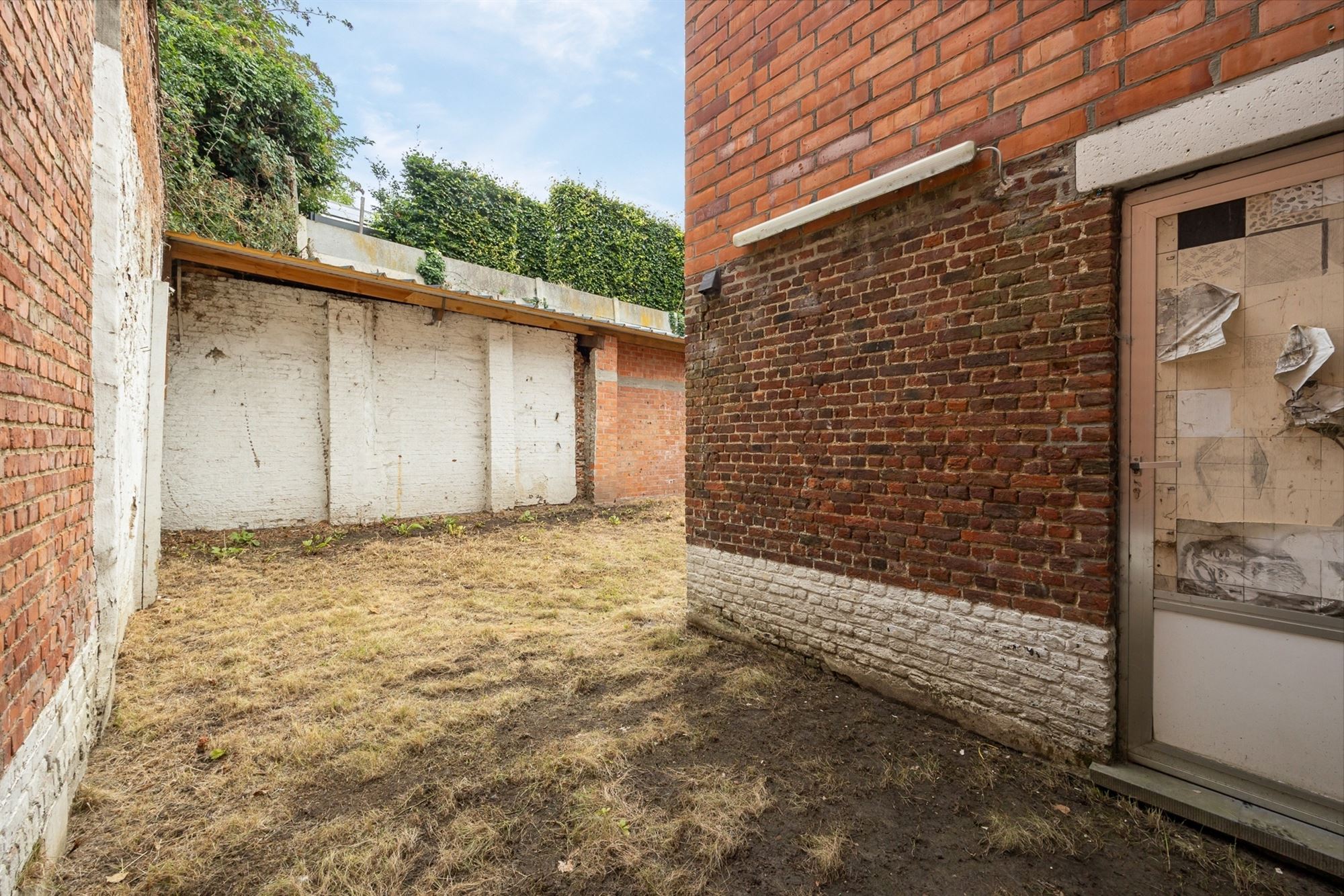 Te renoveren woning met tuin in Heist-op-den-Berg foto 13