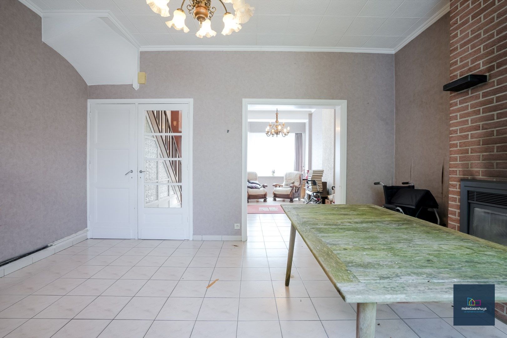 Centraal gelegen te renoveren woning in rij met tuin te Mariakerke foto 8