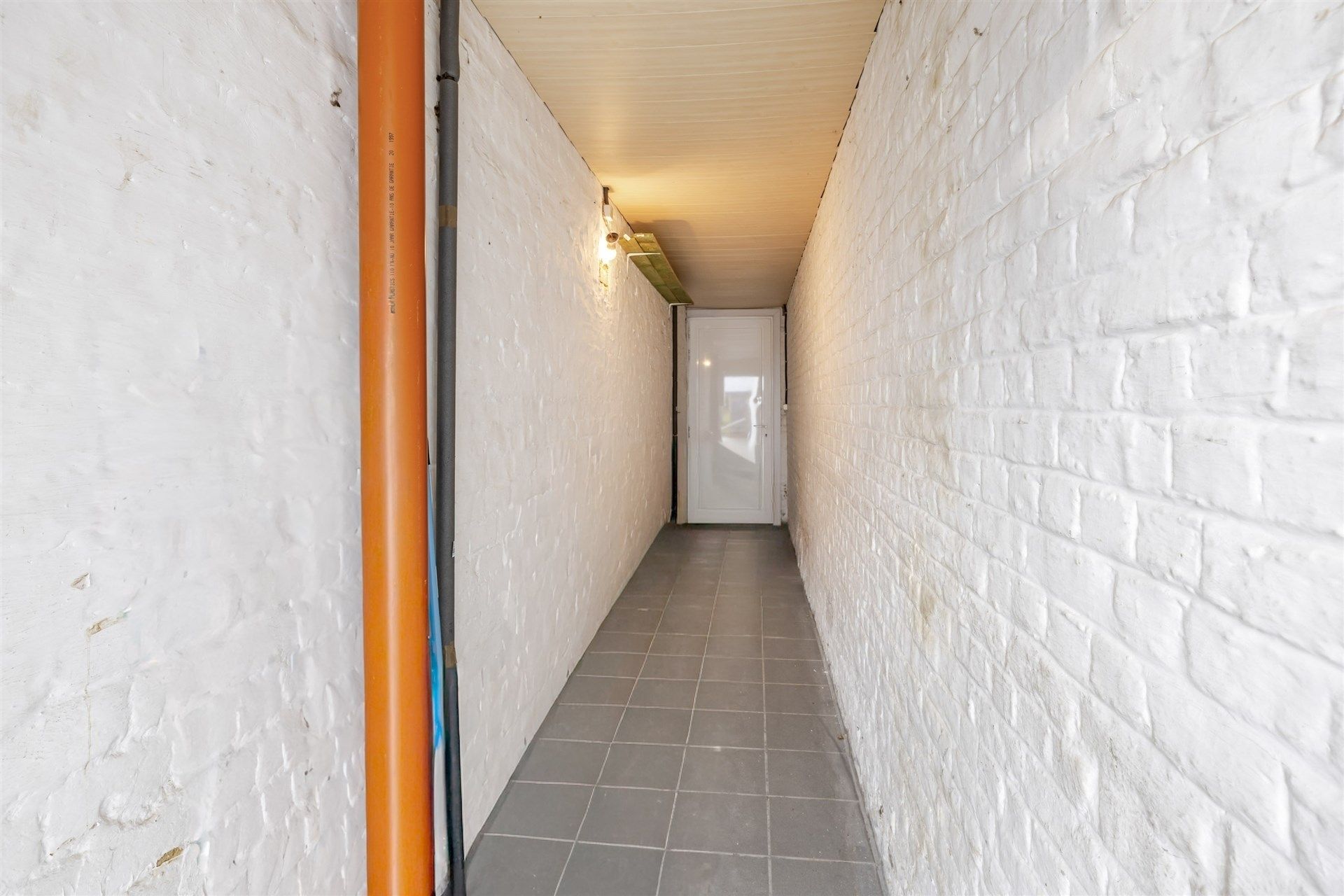 Gezellige rijwoning met uitzonderlijke grote tuin en externe garage in hartje Schellebelle foto 22