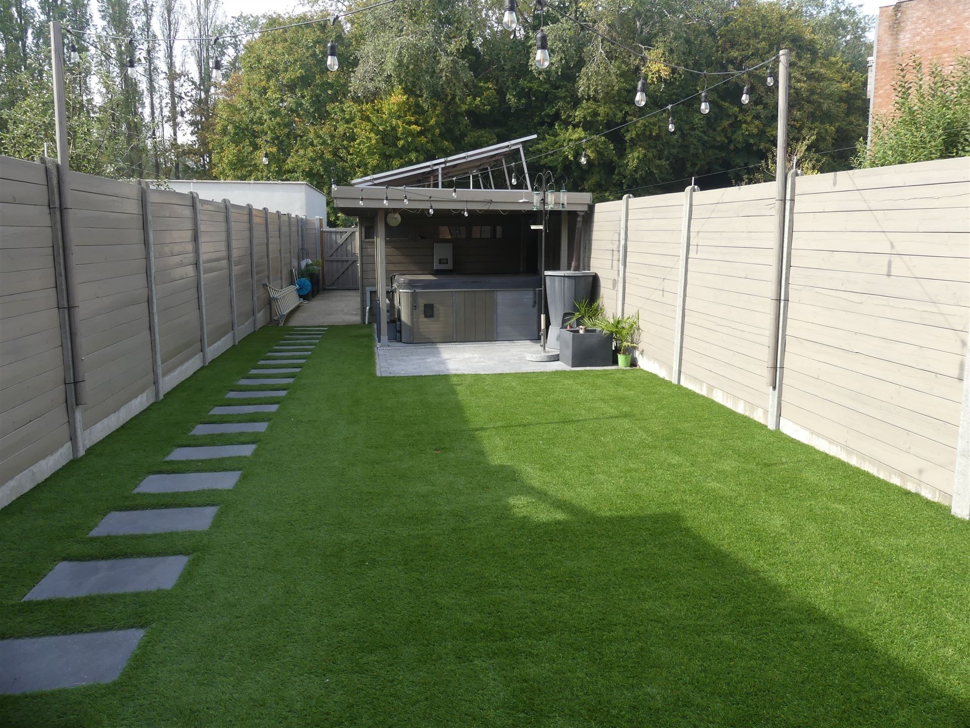 Charmante woning met tuin en uitweg voor fietsen! foto 14