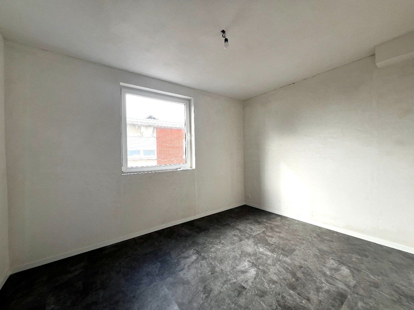 Energiezuinig en instapklaar appartement te huur in hartje Harelbeke! foto 16