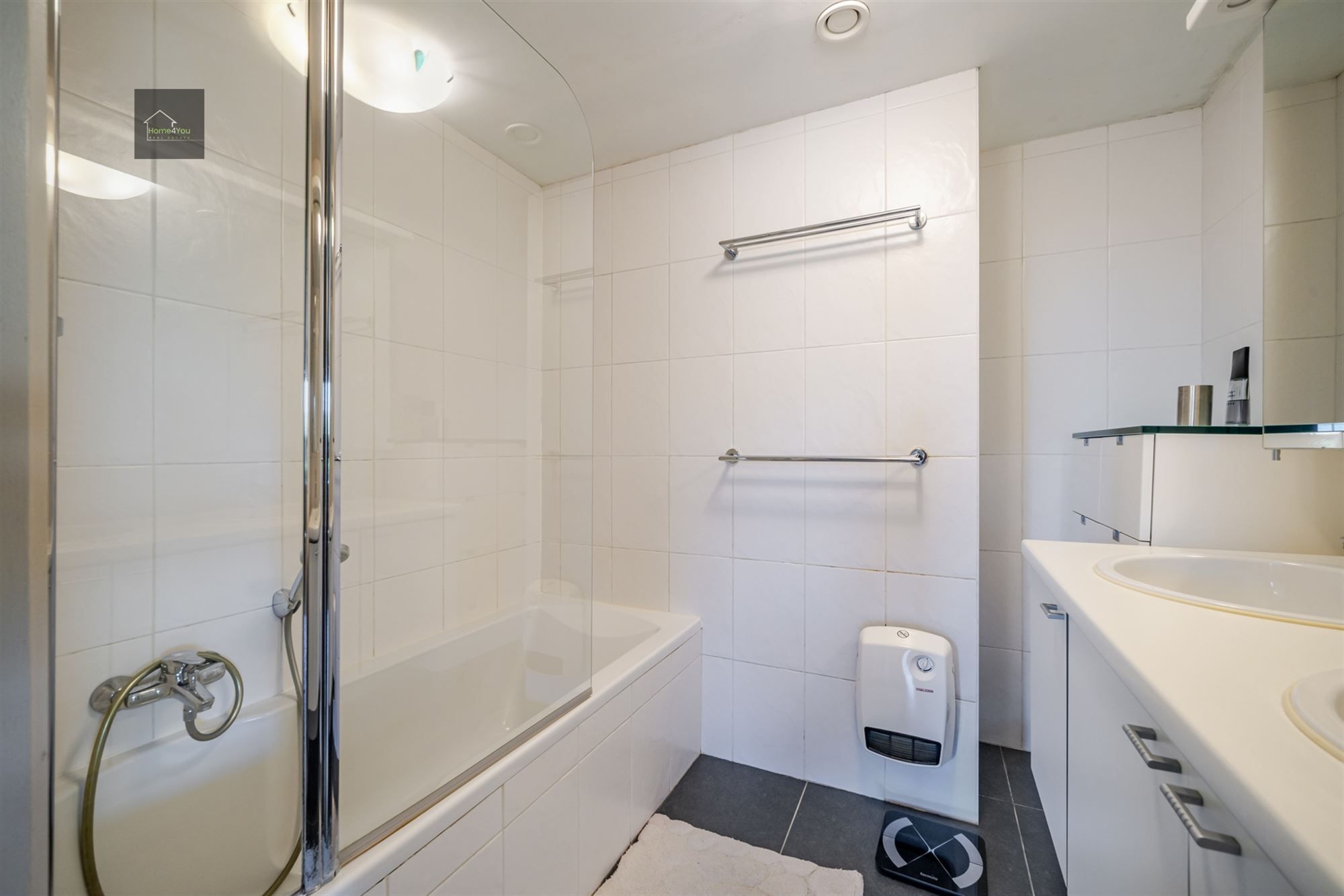 Instapklaar ruim gelijkvloersappartement met tuin! foto 10