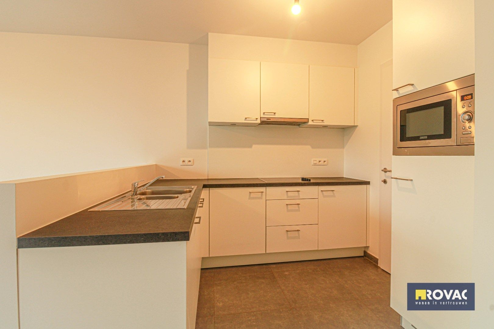 Gelijkvloers appartement met tuin en garage! foto 11