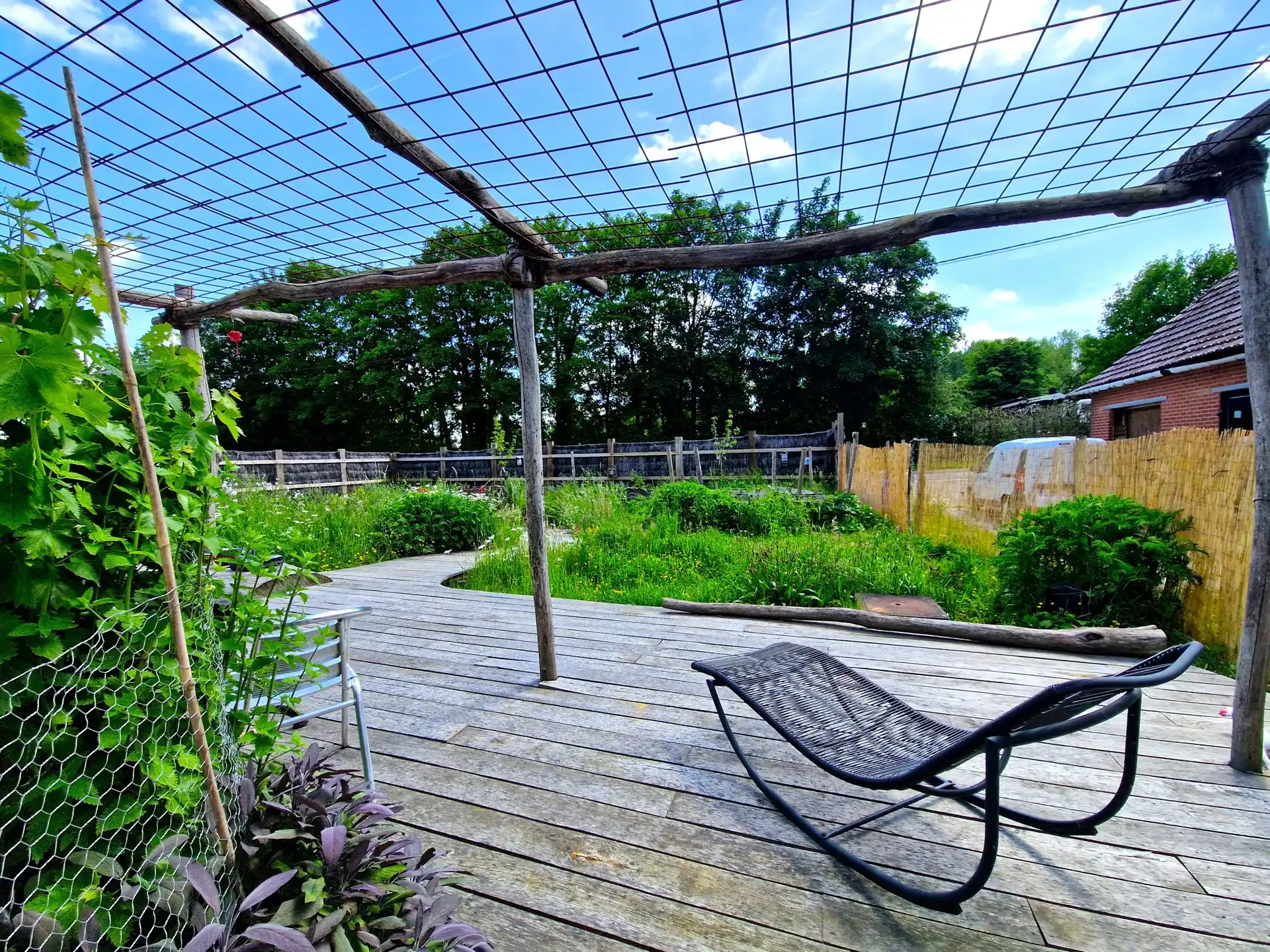Tiny house met prachtige tuin en weids uitzicht op ca. 60a. foto 5