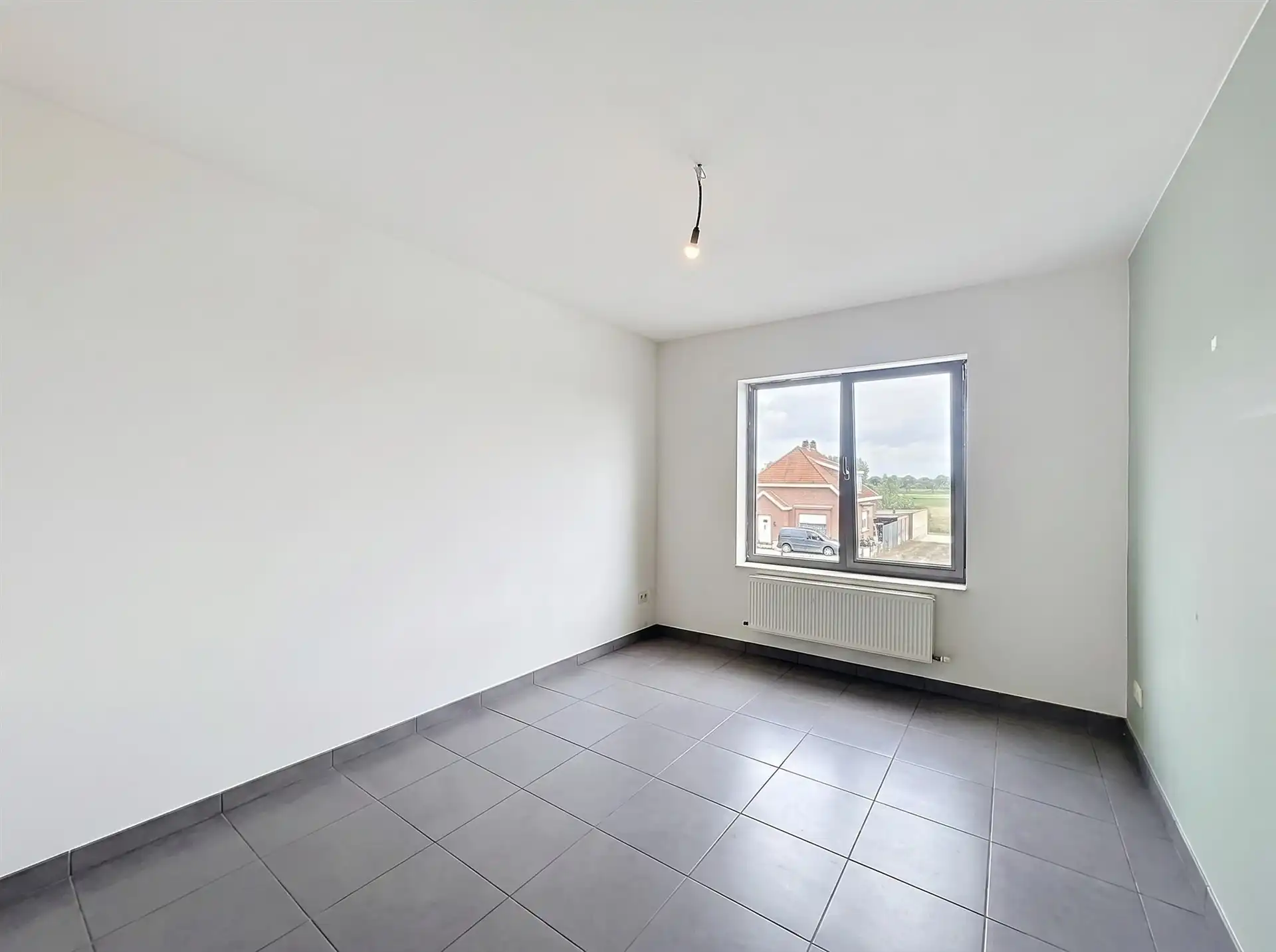 Recent en ruim 2-slaapkamer appartement met staanplaats nabij centrum Sint-Pauwels! foto 9