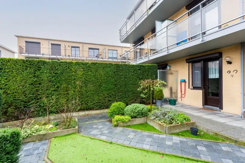 Gelijkvloers 2 slpk. appartement met tuin en garage foto 13