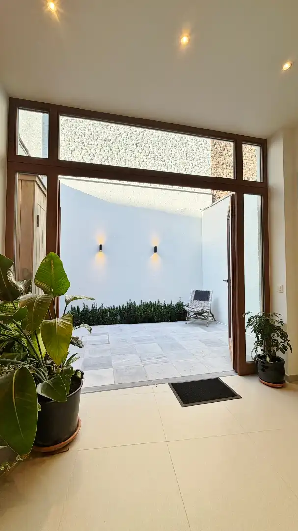 Volledig vernieuwde en energiezuinige stadswoning met 2 terrassen in de stadskern. foto 6
