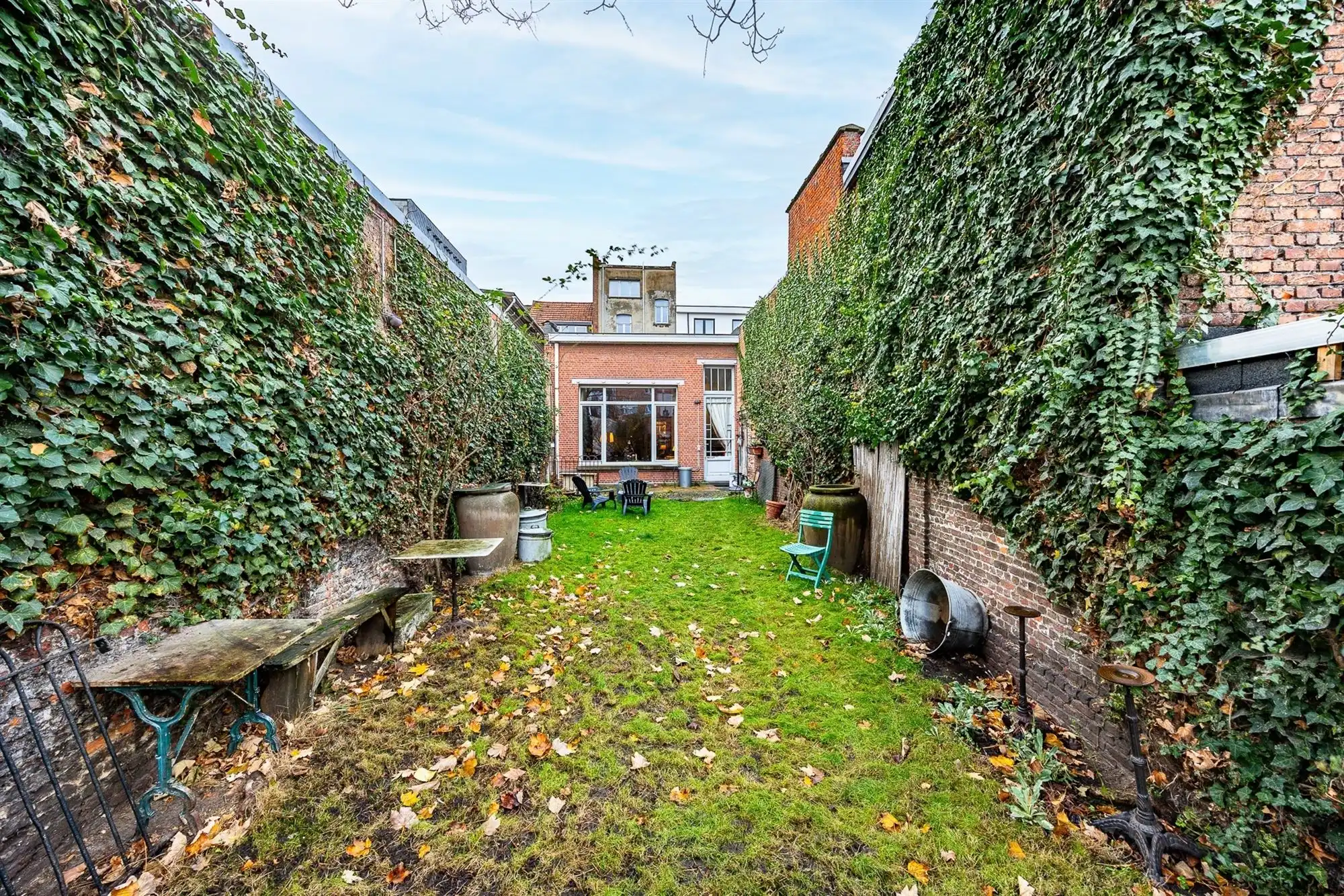 Prachtig winkelwoonhuis in eclectische stijl met 6 slk + zuidtuin foto 32