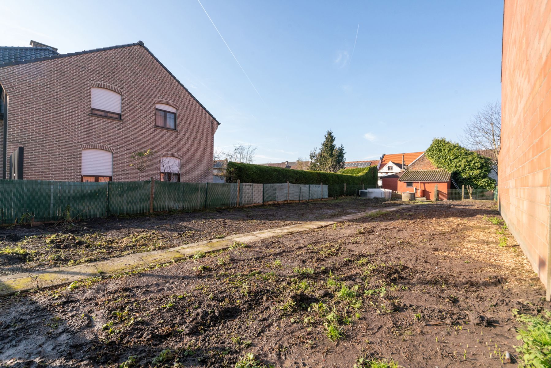 TE KOOP - bouwgrond van 3a19ca voor een halfopen bebouwing foto 5